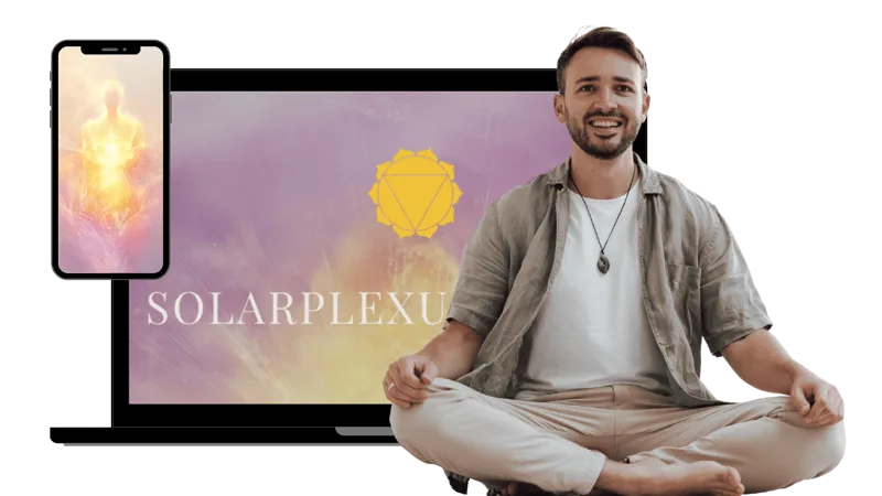 Andreas Schwarz vor einem Bildschirm in Gelbtönen – Solarplexuschakra-Webinar